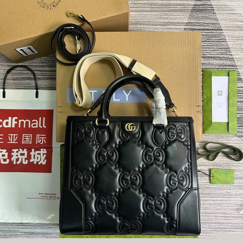 G*u*i top handle bags
